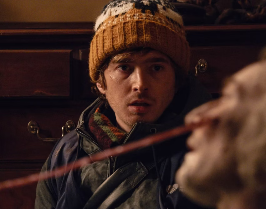 a man in a knitted hat is looking at a women